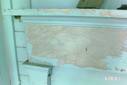 Manual removal of modern latex paint reveals original faux marble finish